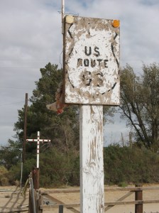 Old Route 66 sign and cross Helendale, CA